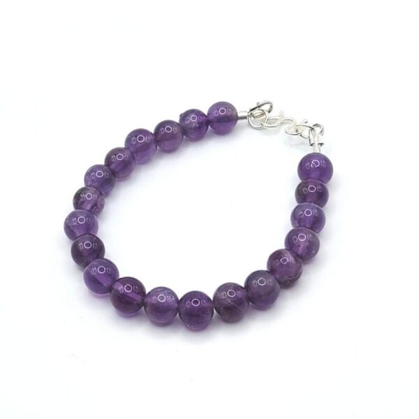 Amethyst baby bracelet with sterling silver clasp, charms